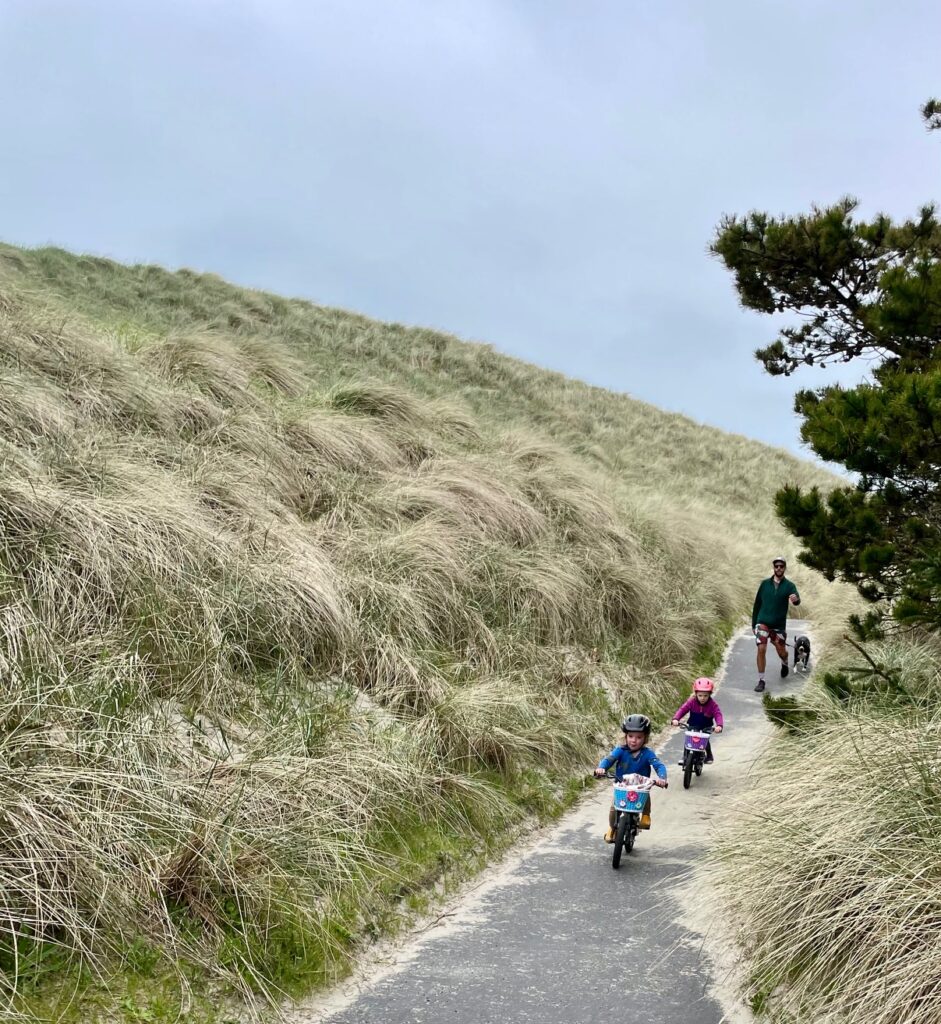 family on beach path